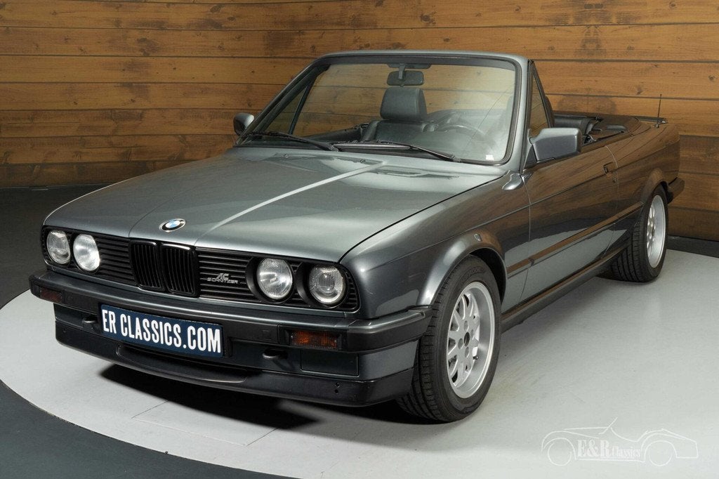 BMW 320i Cabriolet | 1989, Auto's, Oldtimers, Achterwielaandrijving, Zwart, 4 stoelen, Leder