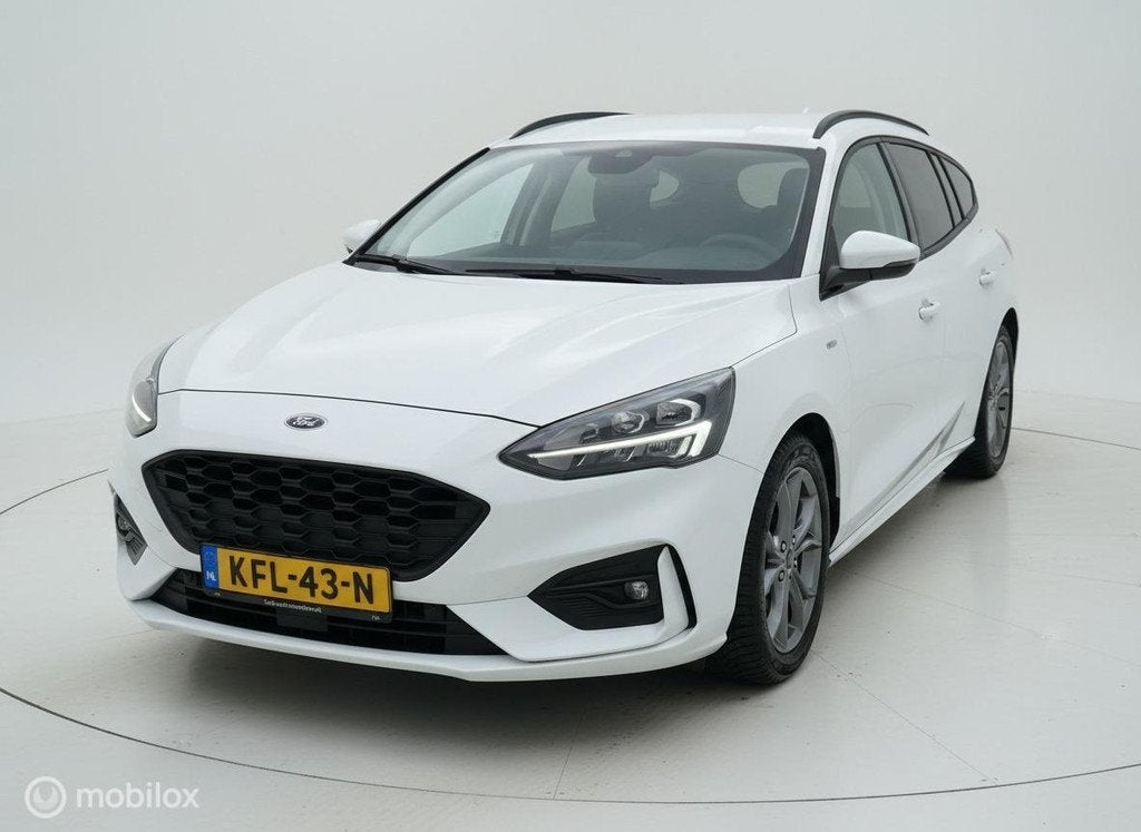 Ford Focus Wagon 1.5 EcoBoost ST Line Business LED|HUD|B&O|, Auto's, 1345 kg, 181 pk, Alcantara, Wit