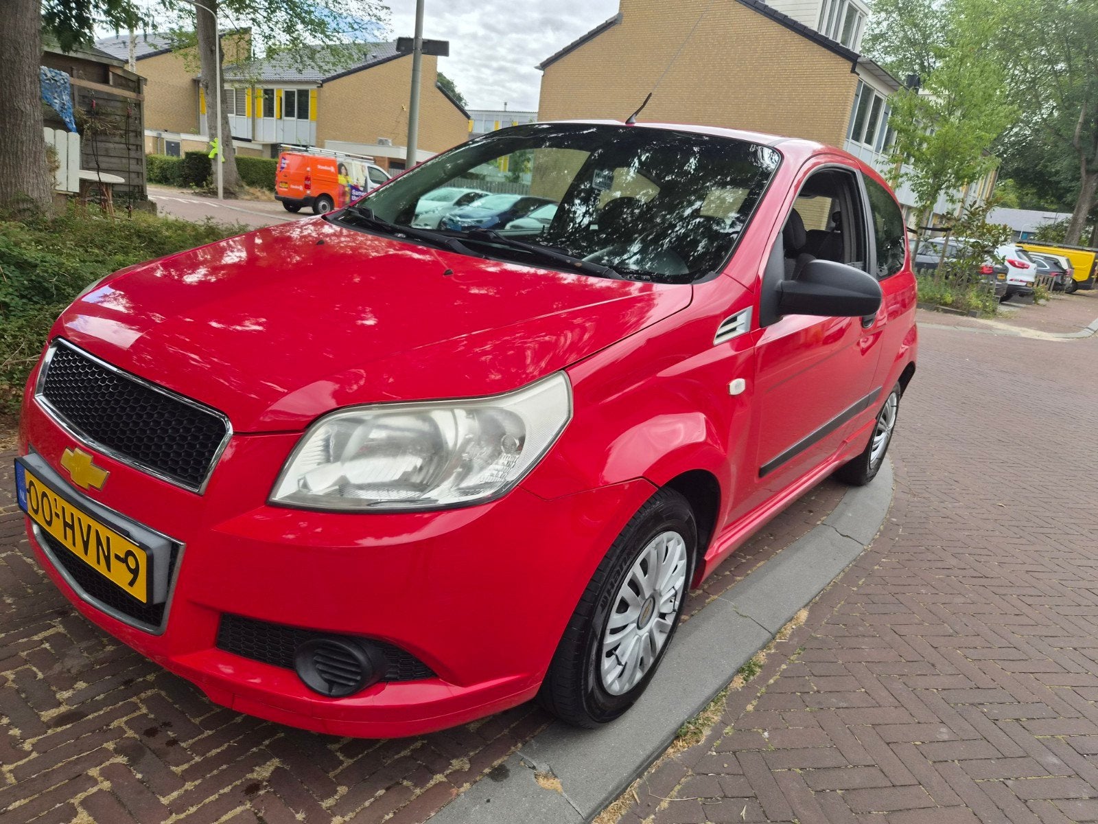 Chevrolet Aveo 1.2 16V 3D | NAP | Nieuwe APK 08-202, Auto's, Voorwielaandrijving, 40 €/maand, Aveo, 4 cilinders