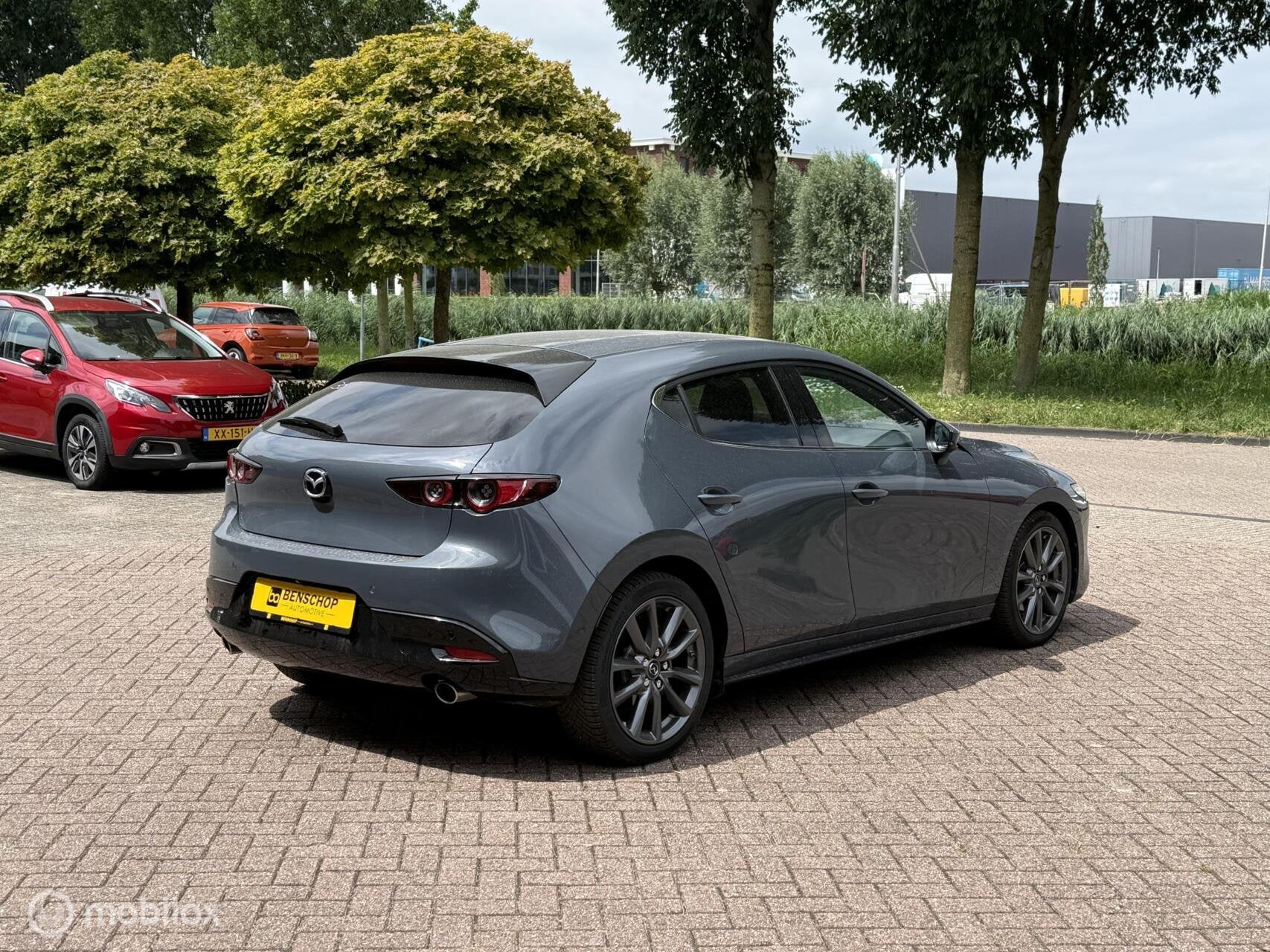 Mazda 3 2.0 e-SkyActiv-G M Hybrid 122 Luxury Leer Bose Navi, Auto's, Voorwielaandrijving, 1998 cc, Zwart, 4 cilinders