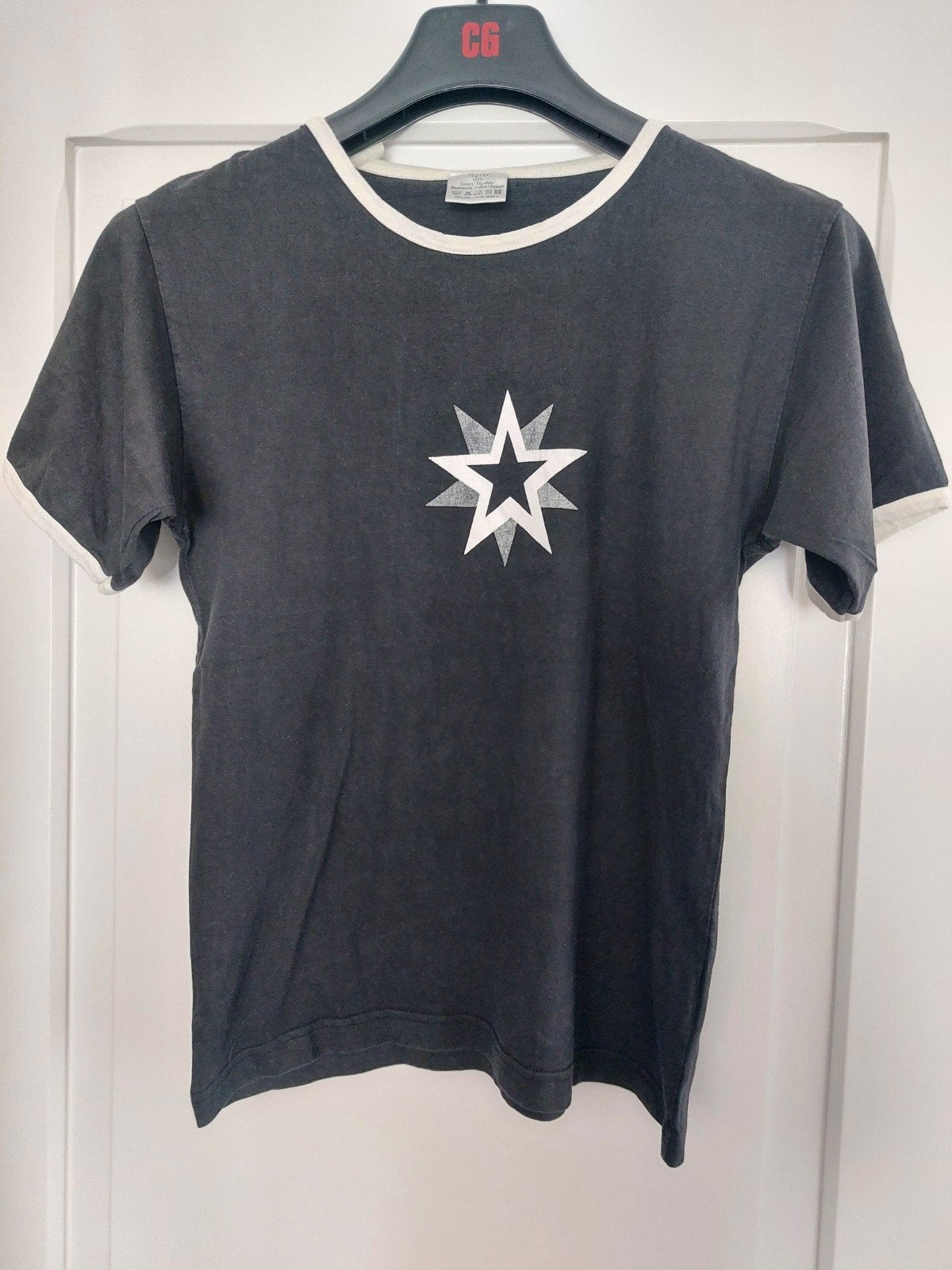 Zwart shirt met sterren maat 152, Ophalen of Verzenden, Zo goed als nieuw, Meisje, Shirt of Longsleeve