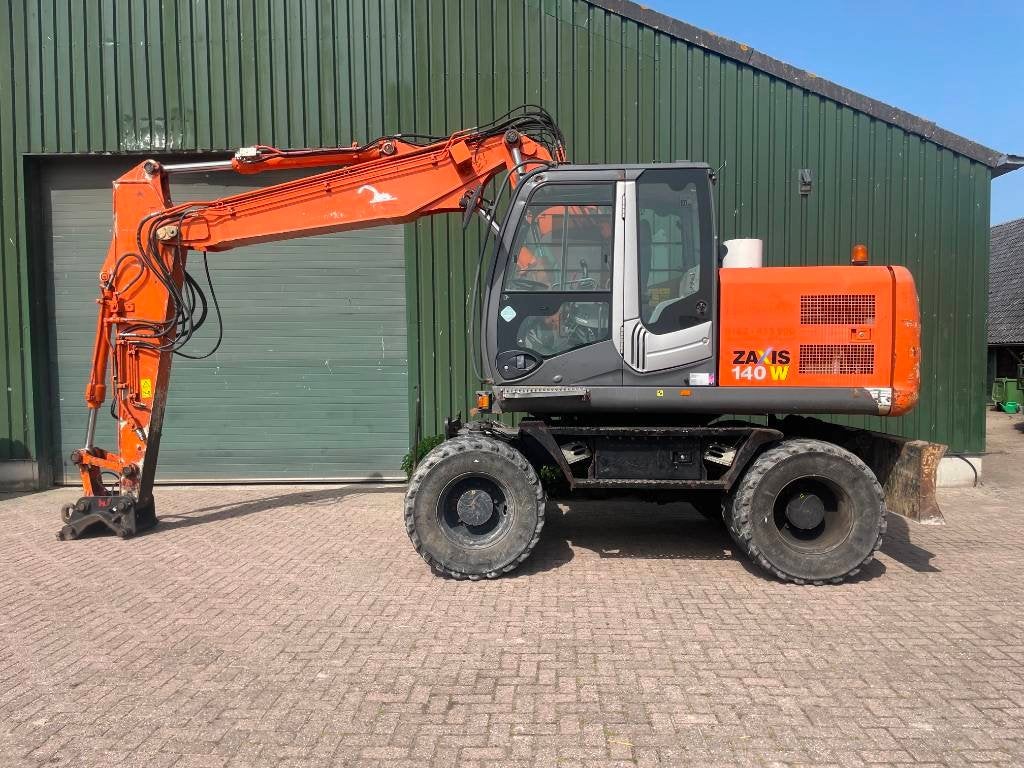Hitachi ZX 140 W-3 mobiele kraan (bj 2011), Zakelijke goederen, Machines en Bouw | Kranen en Graafmachines, Graafmachine
