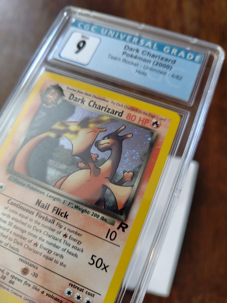 Pokemon kaart 2000 Dark Charizard #4 CGC 9 met SWIRL, Ophalen of Verzenden, Zo goed als nieuw, Losse kaart
