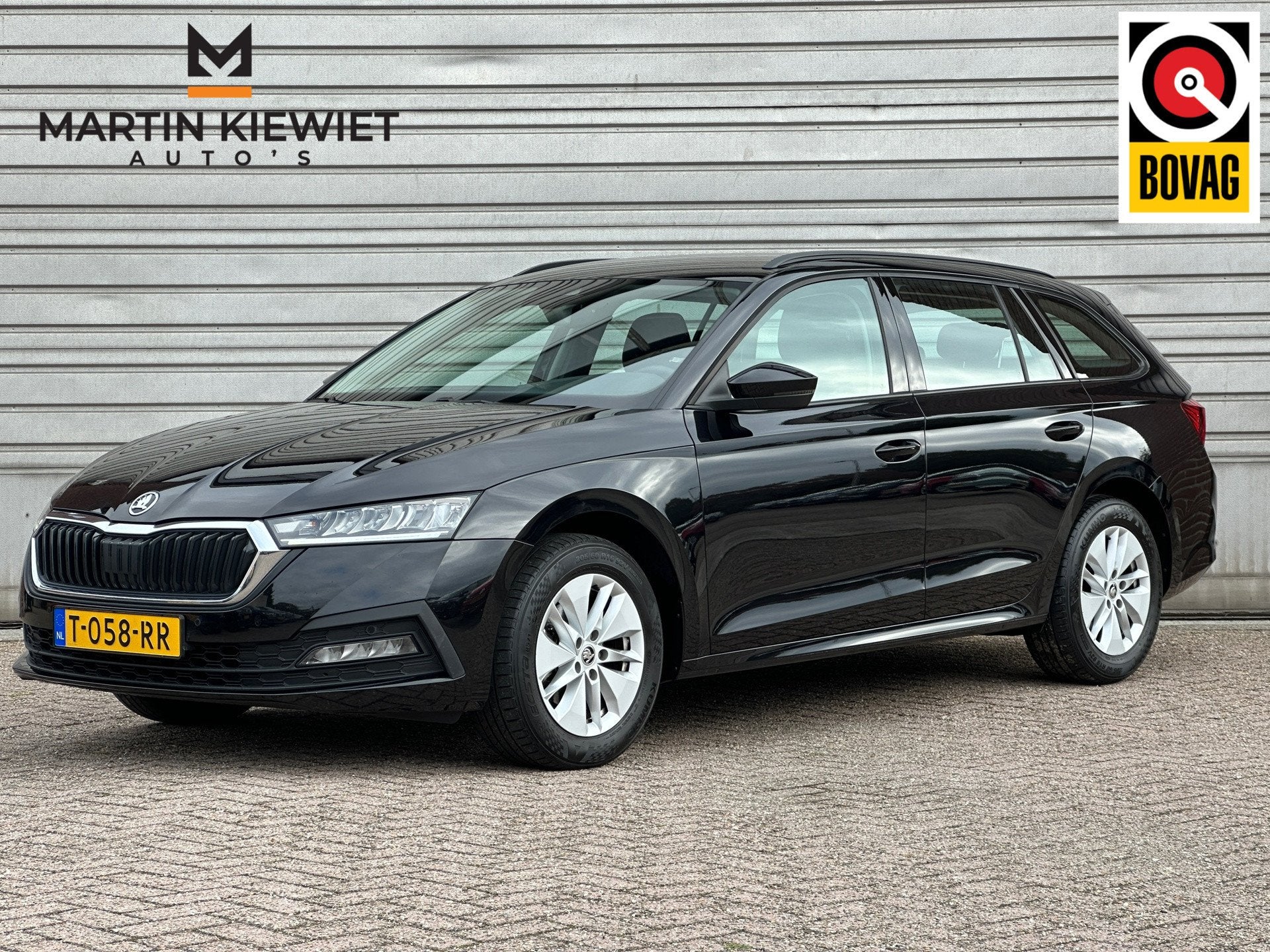 Skoda Octavia Combi 1.0 e-TSI Business Edition|Automaat|PDC, Auto's, Dealer onderhouden, Stof, Gebruikt, Zwart