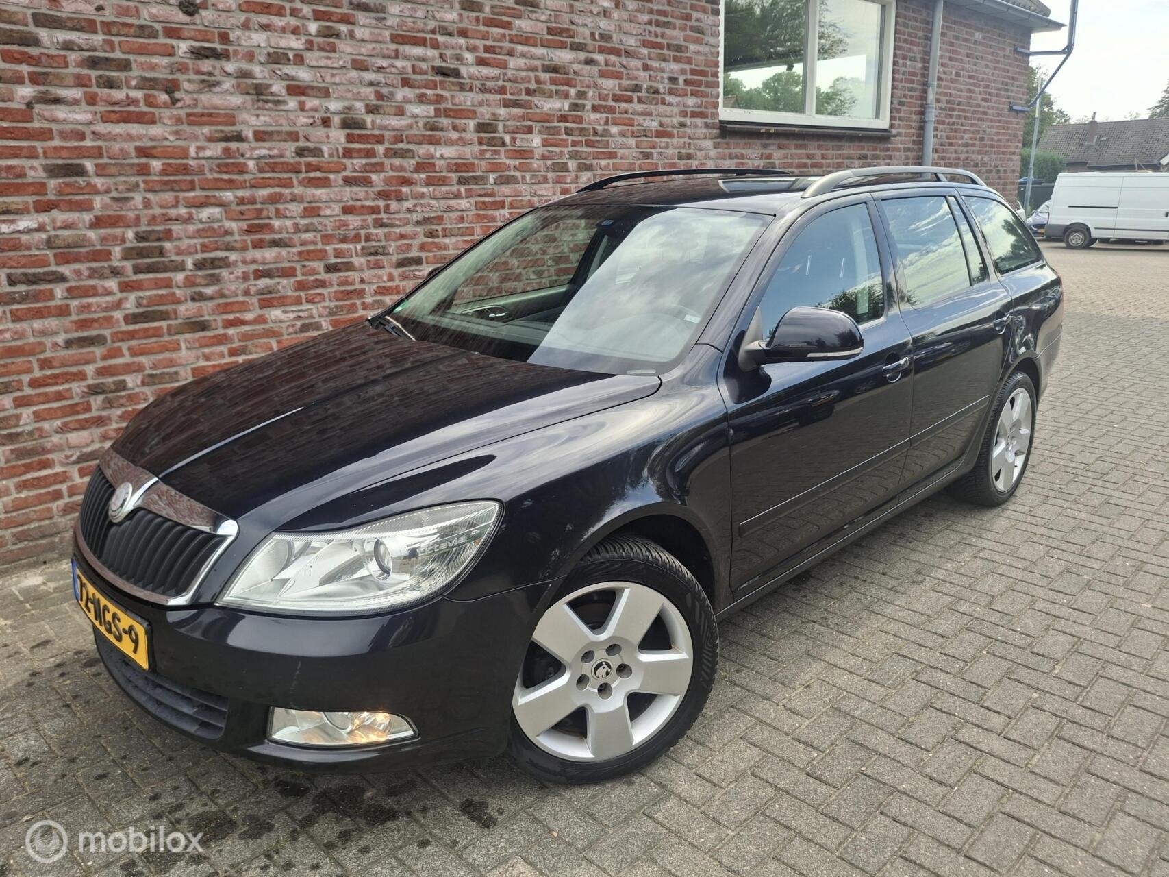 Skoda Octavia Combi 1.2 TSI Ambition Business Line, Auto's, Voorwielaandrijving, Euro 5, Verwarmde buitenspiegels, Gebruikt