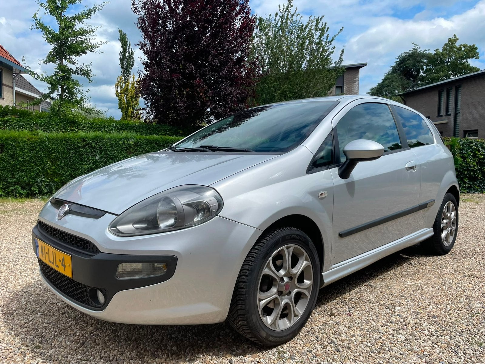 Fiat Punto 1.4 5DR  EVO 2010 | AIRCO | CRUISE |, Voorwielaandrijving, Stof, 40 €/maand, Zwart