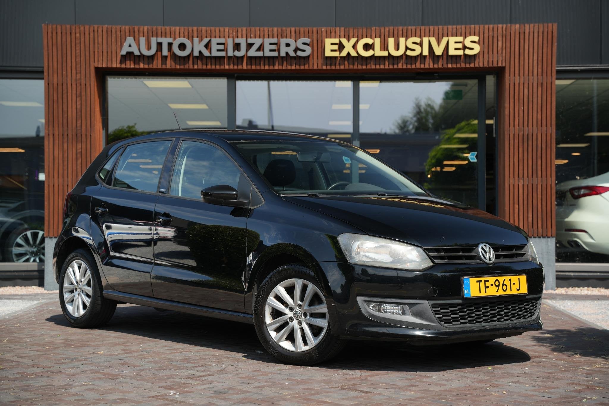 Volkswagen Polo 1.2-12V Comfortline Airco Cruise Control, Voorwielaandrijving, Euro 5, 1198 cc, Zwart