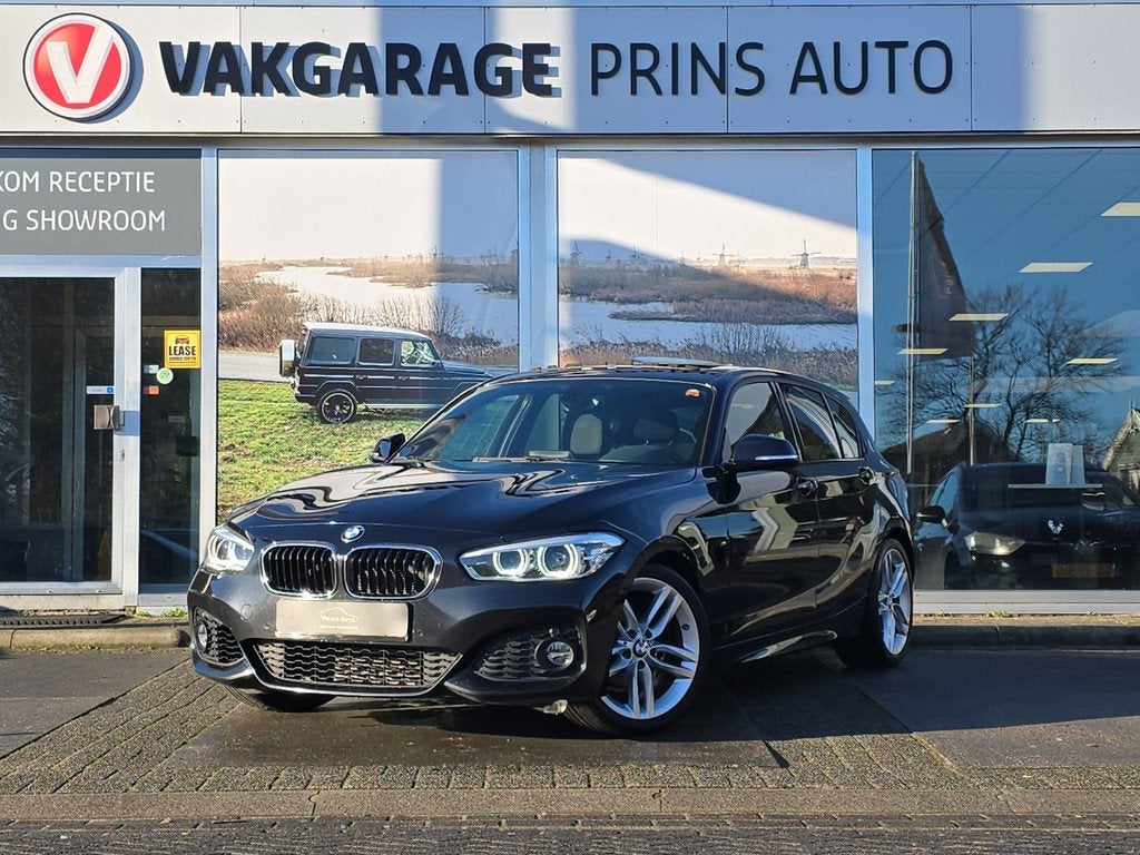 BMW 1-serie 118i High Executive | PANO | M-PAKKET | STOELVW, Gebruikt, Automatische klimaatregeling, Zwart, Bedrijf