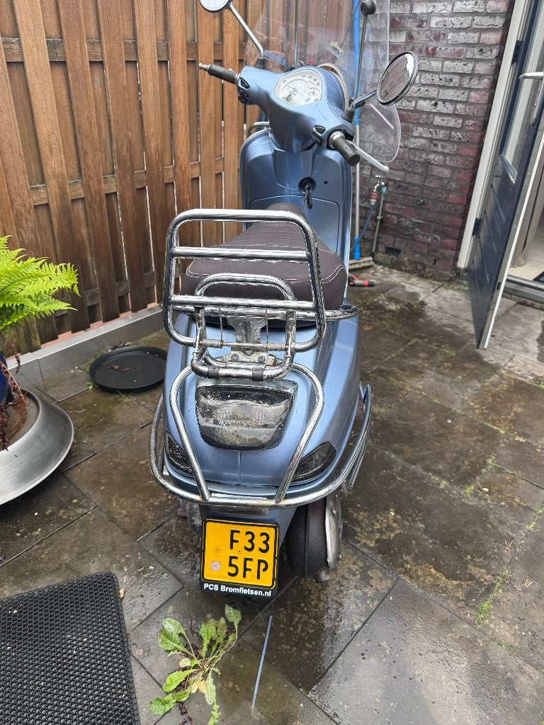 Foto 8 van vespa lx piaggio brommer