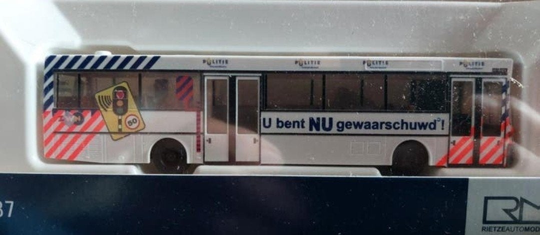 H0LK 0718 MERCEDES-BENZ 0405 POLITIE BUS 1/87, Ophalen of Verzenden, Nieuw, Bus of Vrachtwagen, Rietze