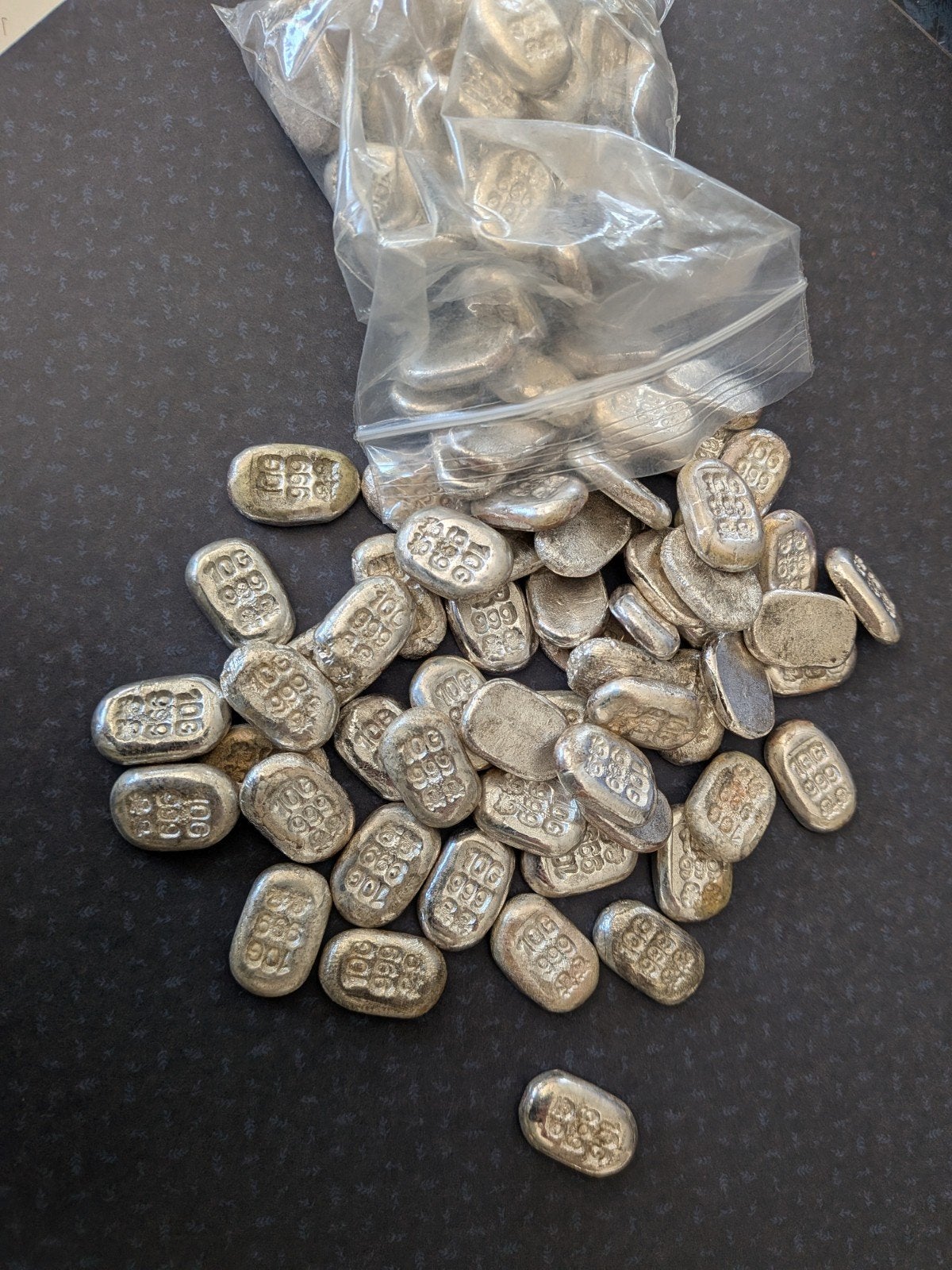 zilver halve kg crossbones te koop 999, Postzegels en Munten, Ophalen of Verzenden, Zilver