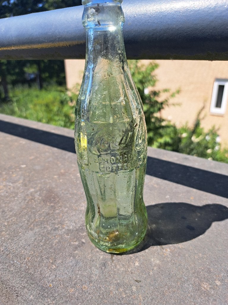 Coca-Cola flesje uit 1957 opgedoken Reeuwijks Plassen, Ophalen of Verzenden, Gebruikt, Verpakking