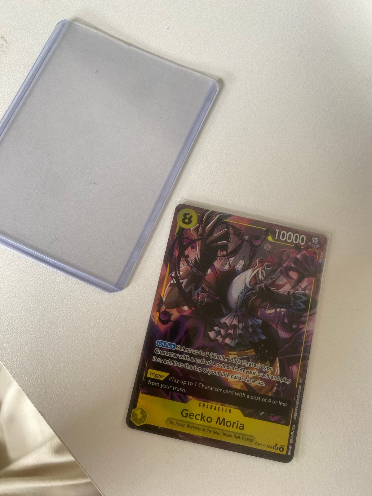 One Piece TCG - Gecko Moria OP14-104 SR AA - Engels, Ophalen of Verzenden, Nieuw, Losse kaart
