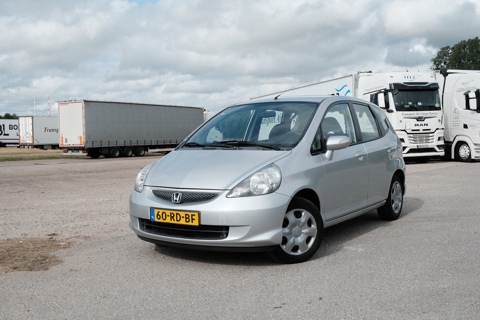 Honda Jazz 1.4 I 2005 Grijs, Auto's, Honda, Voorwielaandrijving, 40 €/maand, 4 cilinders, Origineel Nederlands