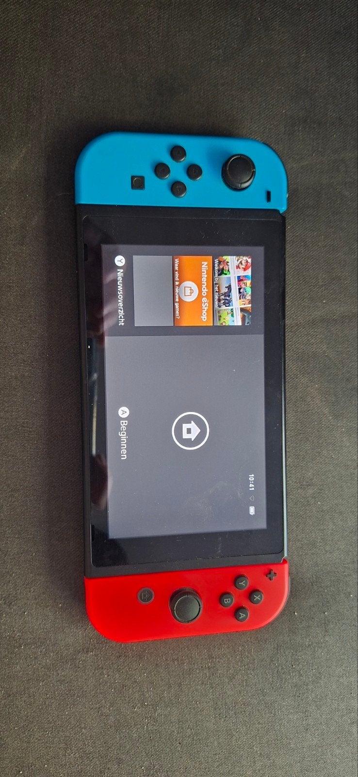 Nintendo Switch met 2 controllers en 4 spellen