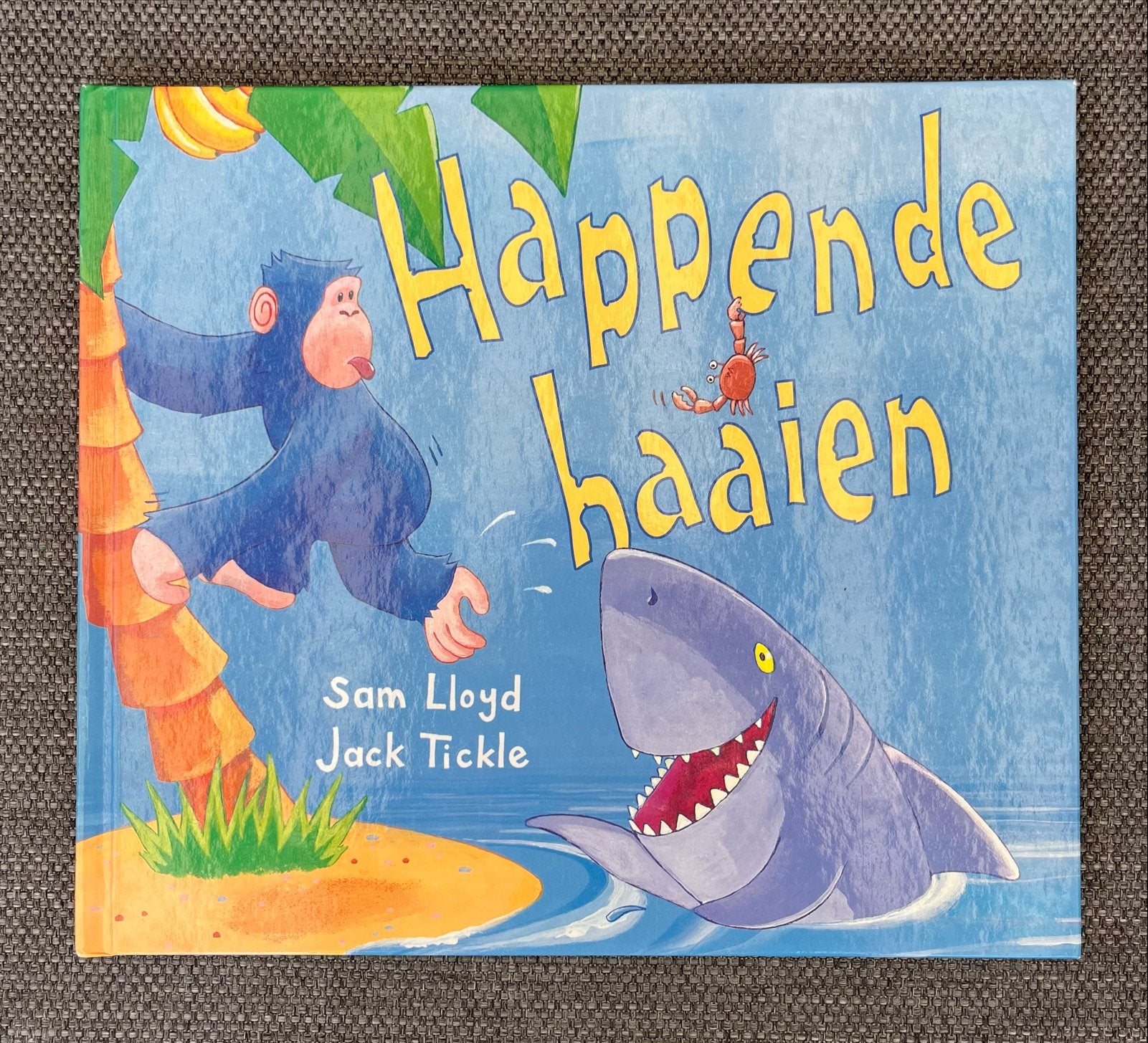 S. Lloyd - Happende haaien, Boeken, Ophalen of Verzenden, Zo goed als nieuw, S. Lloyd, Prentenboek
