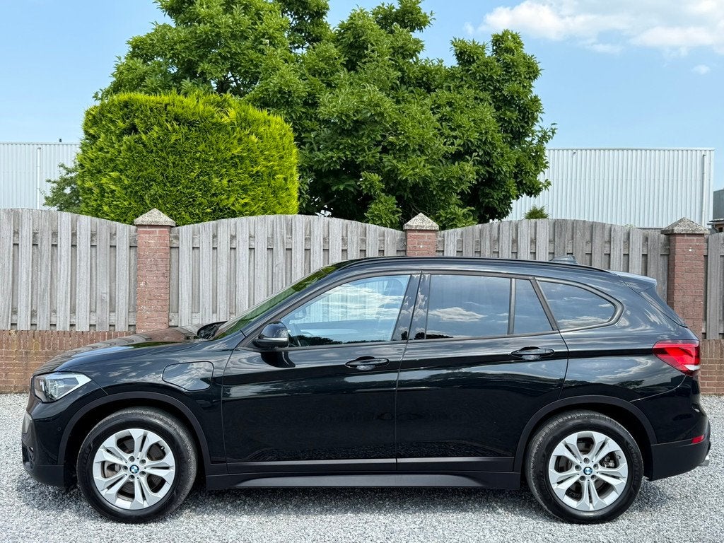 BMW X1 XDrive25e Business Edition Plus VOL LEER STOELVERWARM, Auto's, BMW, 125 pk, Gebruikt, Zwart, Zwart
