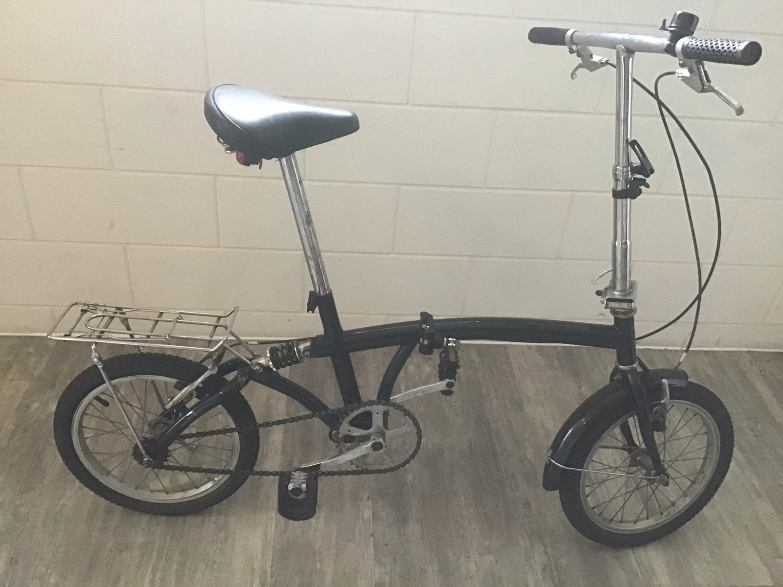 Zwarte vouwfiets 16 inch met vering - Compact en roestvrij, Ophalen, Gebruikt, Totaal opvouwbaar, 16 tot 18 inch
