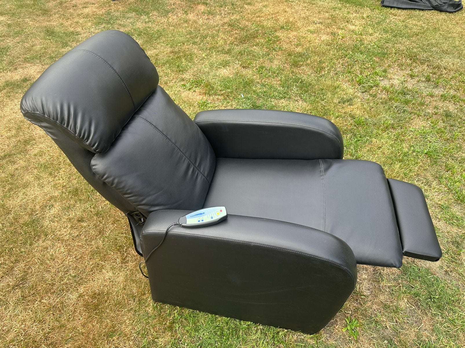Nette massage stoel zwart leer ivm verandering interieur, Huis en Inrichting, Ophalen, Gebruikt, 50 tot 75 cm, Leer