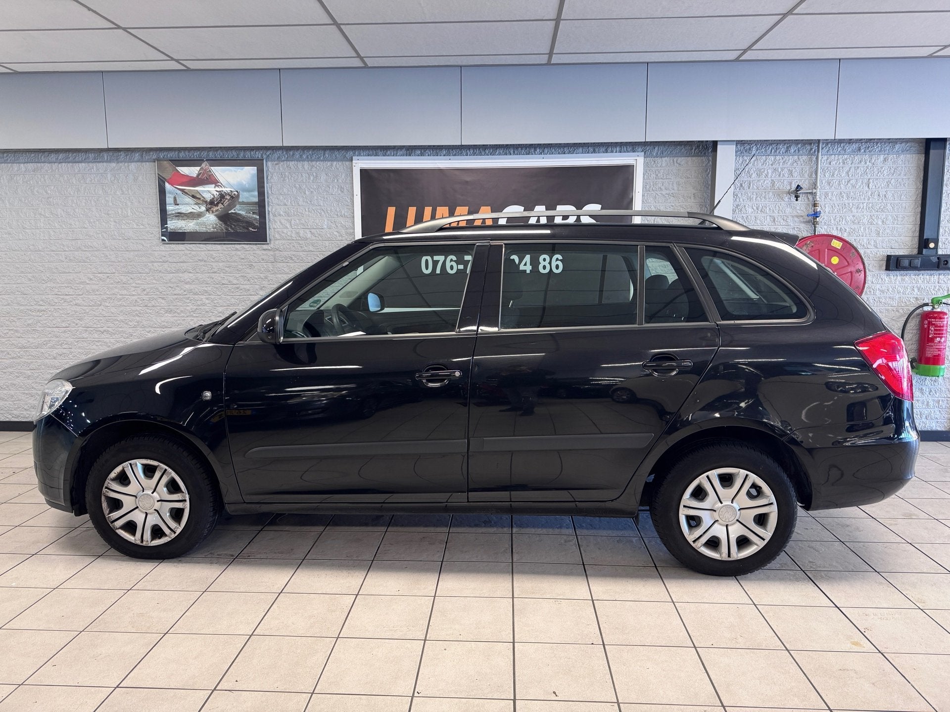 Skoda Fabia Combi 1.4-16V Ambiente | Nieuwe APK | Cruise |, Auto's, Voorwielaandrijving, 4 cilinders, Verwarmde buitenspiegels