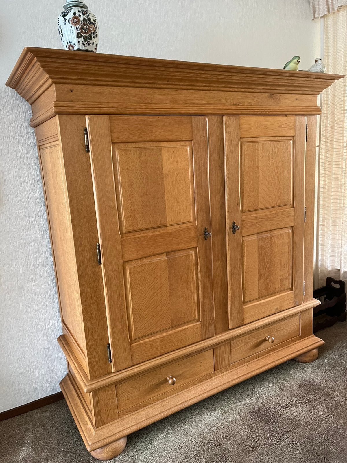 Geloogd eiken kast, Ophalen