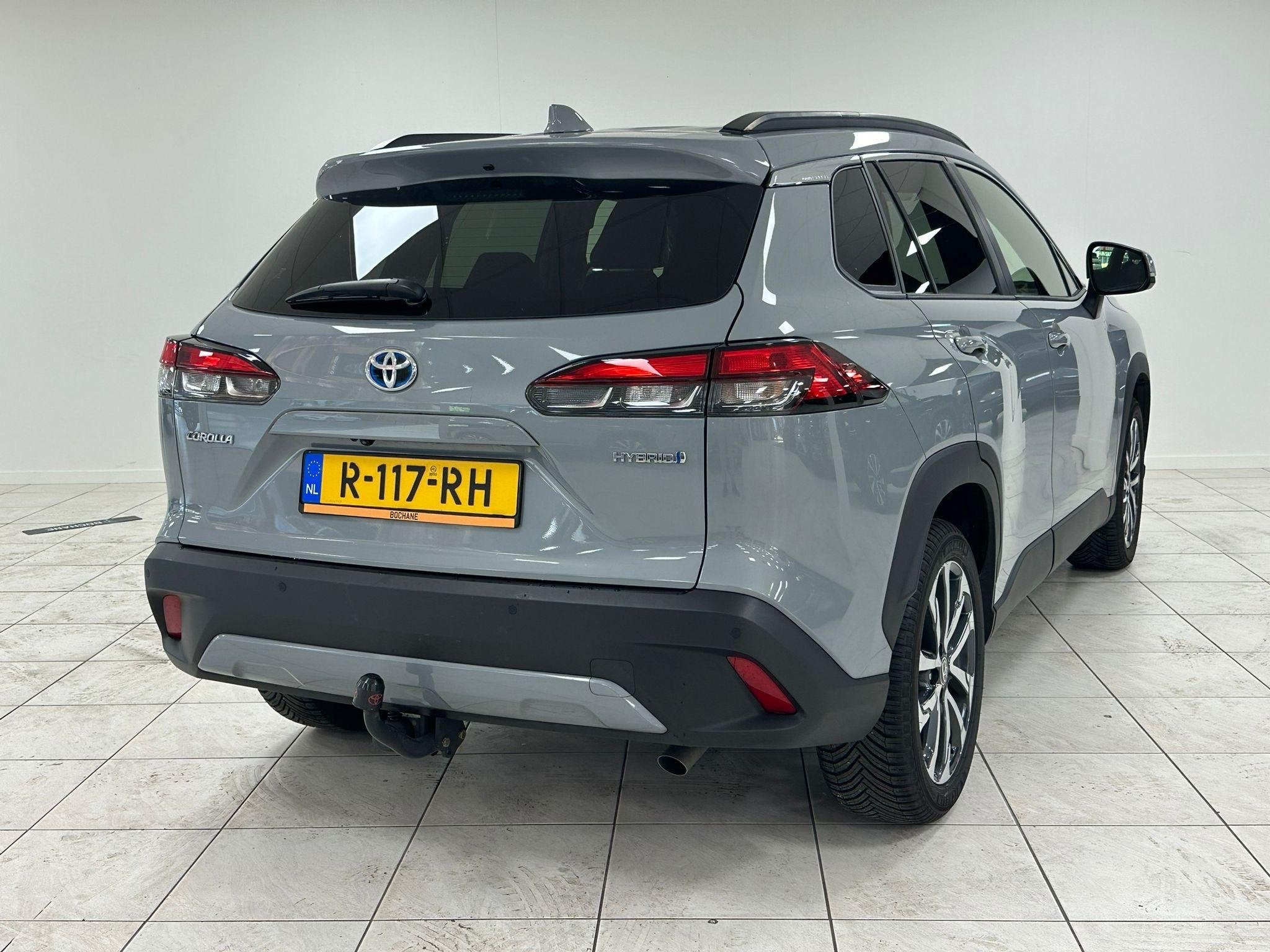 Toyota Corolla Cross 2.0 High Power Hybrid First Edition TRE, Gebruikt, 4 cilinders, Met garantie (alle), Automatische klimaatregeling