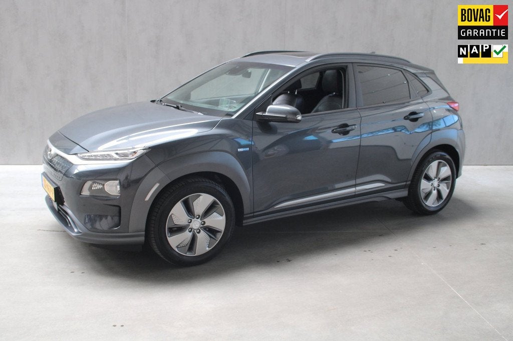 Hyundai Kona EV Premium 64 kWh SOH 92% Camera/Schuifdak/Trek, Auto's, Hyundai, 12 maanden, Gebruikt, Origineel Nederlands, 1066 min
