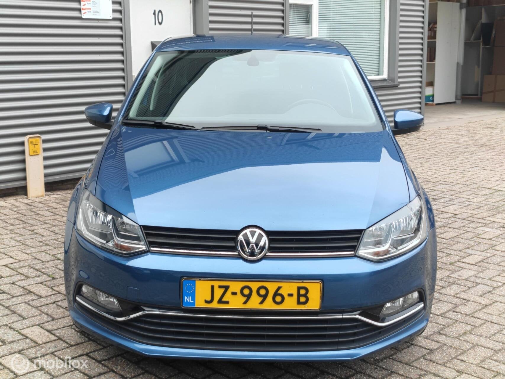 Volkswagen Polo 5-deurs 1.2TSi Highline Executive Clima Navi, Auto's, 40 €/maand, Euro 6, 4 cilinders, Blauw