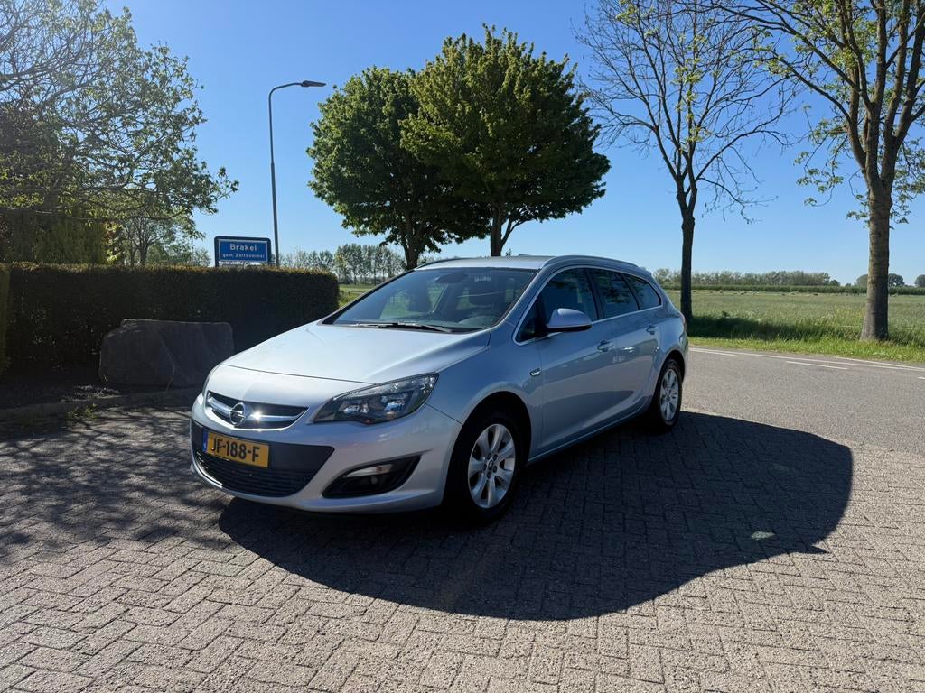 Opel Astra 1.4 Turbo 103KW ST 2016 Grijs, Auto's, Voorwielaandrijving, Stof, 4 cilinders, Origineel Nederlands