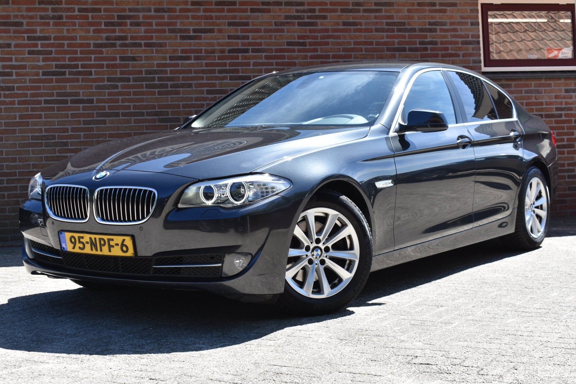 BMW 5-serie 523i High Executive '10 Xenon Clima Navi Cruise, Auto's, BMW, Euro 5, Achterwielaandrijving, Beige, 2000 kg