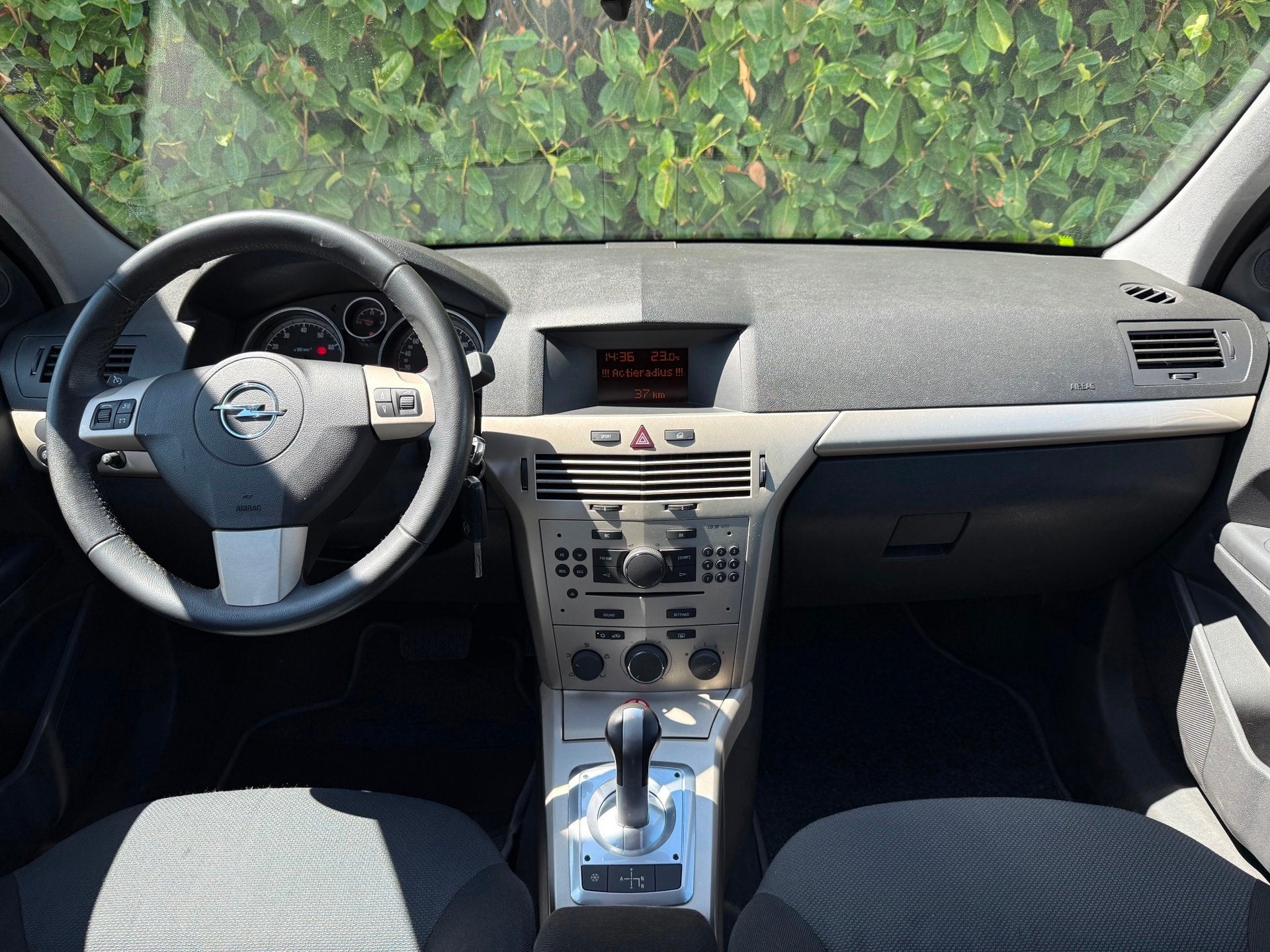 Opel Astra Wagon 1.6 Business AUT|NWE APK|AIRCO|TREKH|CRUISE, Stof, Gebruikt, Zwart, 4 cilinders