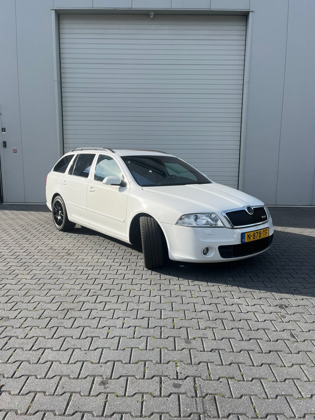 Skoda Octavia 2.0 TFSI Combi RS 380pk, Zwart, 4 cilinders, 1984 cc, Wit