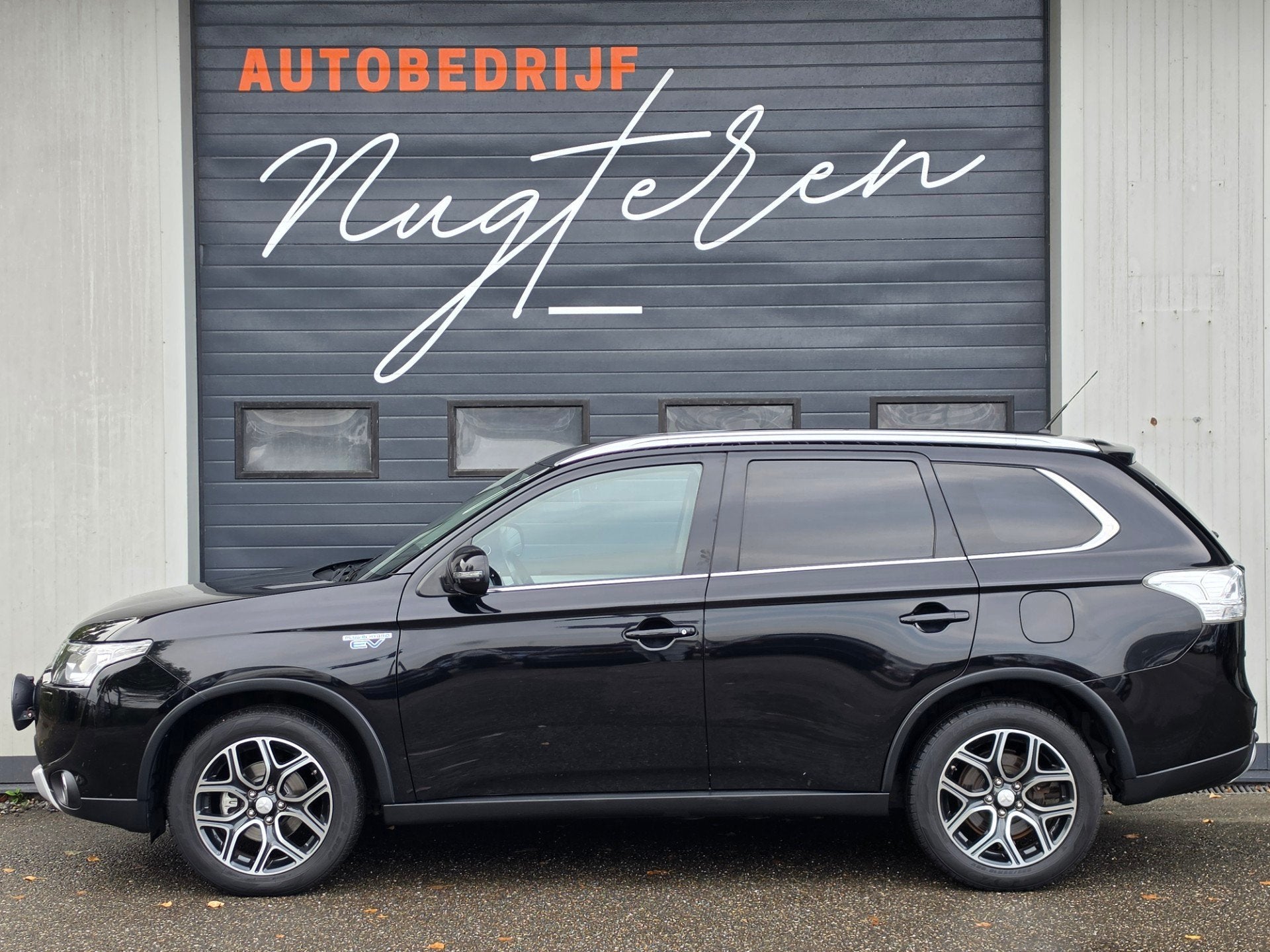 Mitsubishi Outlander 2.0 PHEV Executive Edition X-Line|Trekh, Auto's, Zwart, 4 cilinders, Leder en Stof, Zwart
