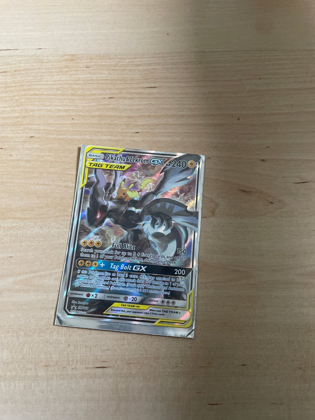Pikachu & Zekrom GX Pokémon kaart met sleeve, Ophalen of Verzenden, Zo goed als nieuw, Losse kaart, Foil