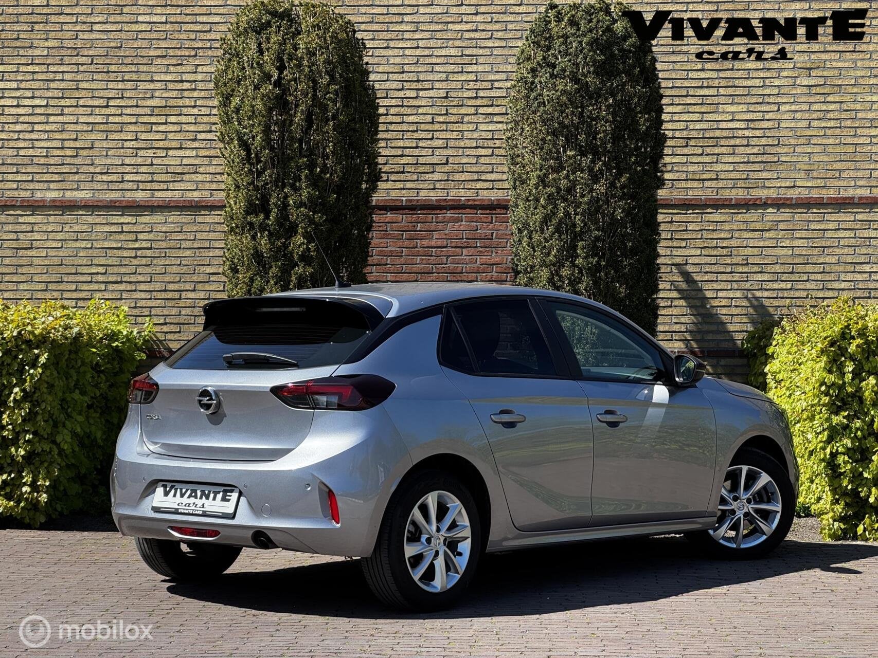 Opel Corsa 1.2 Edition AUT*1e Eig*Cruise*Carplay*Navi*PDC, 101 pk, Gebruikt, Euro 6, Met garantie (alle)