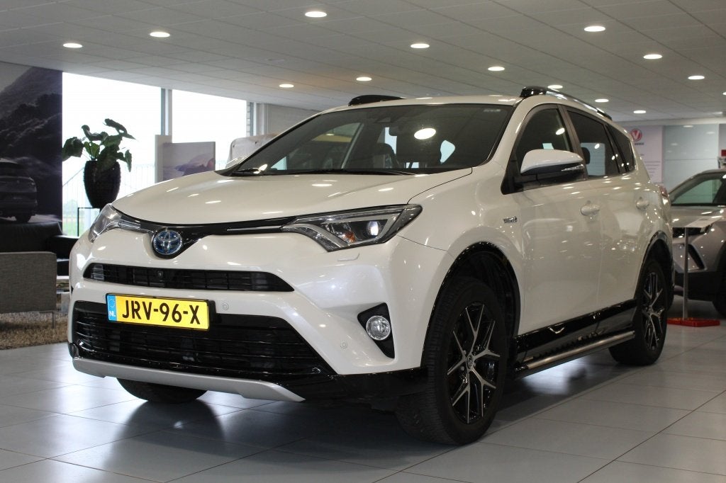 Toyota RAV4 Hybrid Style Selection/LEDER/CAMERA/TREKHAAK, Auto's, Toyota, Gebruikt, Wit, Bedrijf, 155 pk