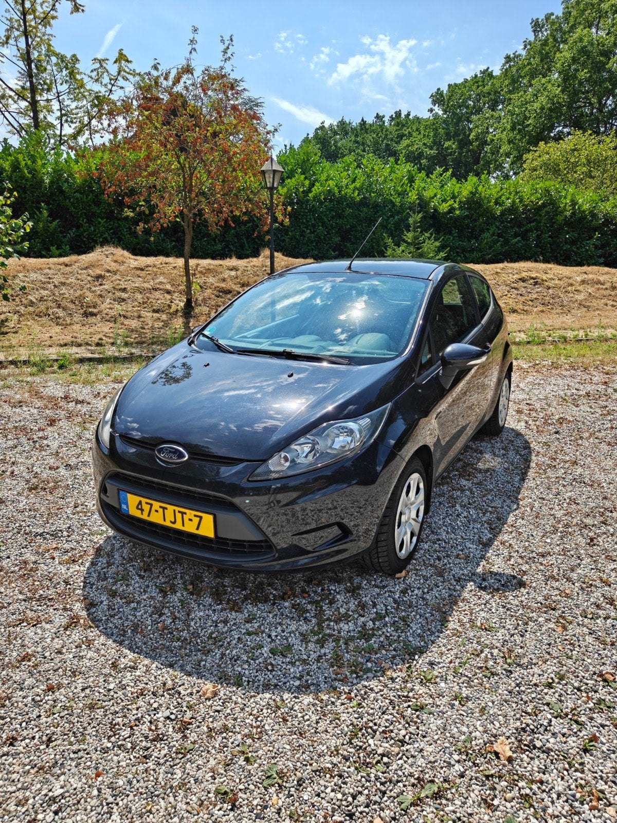 Ford Fiësta 1.25 44KW 3DR 2012 Zwart, Auto's, Voorwielaandrijving, Euro 5, Stof, 4 cilinders