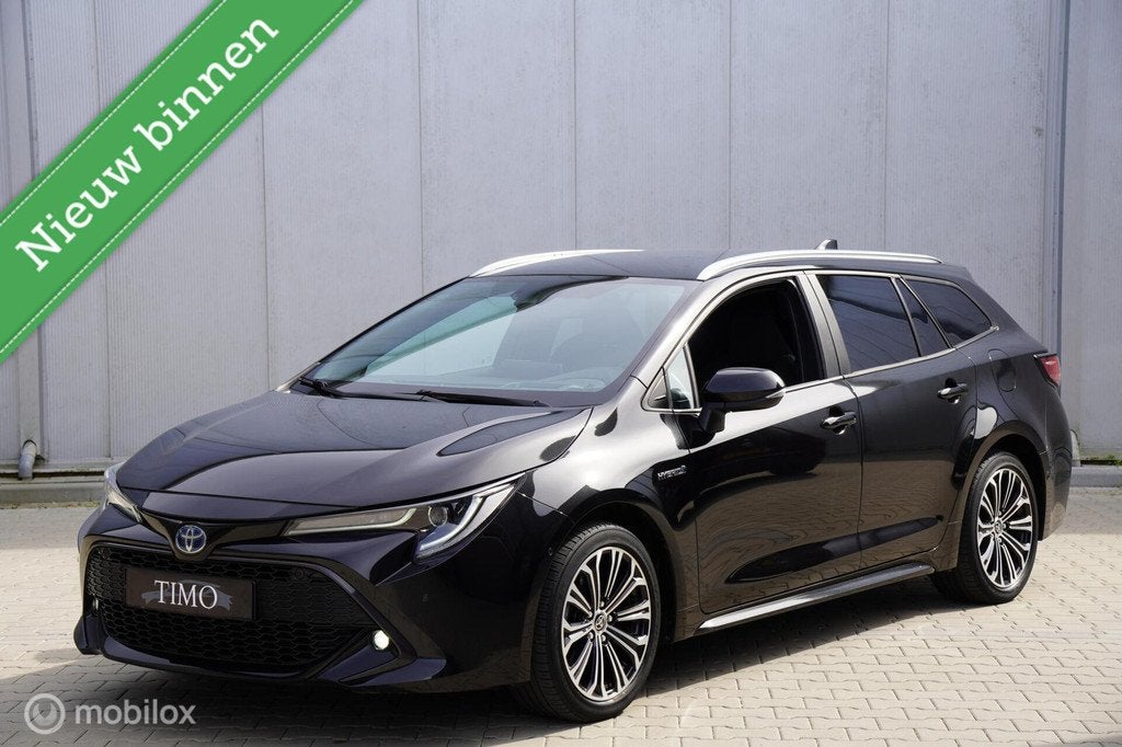 Toyota Corolla TS 1.8 Hybrid 2021 Stoel- en stuurverwarming, Auto's, 1345 kg, Gebruikt, 4 cilinders, Corolla