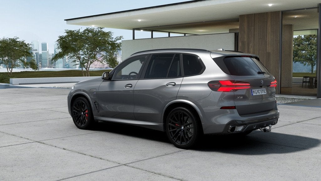 BMW X5 xDrive50e M Sport Automaat / Panoramadak Sky Lounge /, Auto's, BMW, Automaat, Stoelverwarming, 2395 kg, Leder