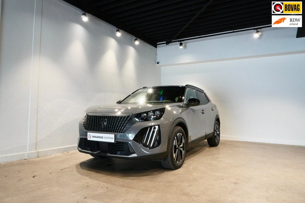 Peugeot E-2008 EV GT 54 kWh, Auto's, Peugeot, Zwart, 156 pk, Leder en Stof, Origineel Nederlands