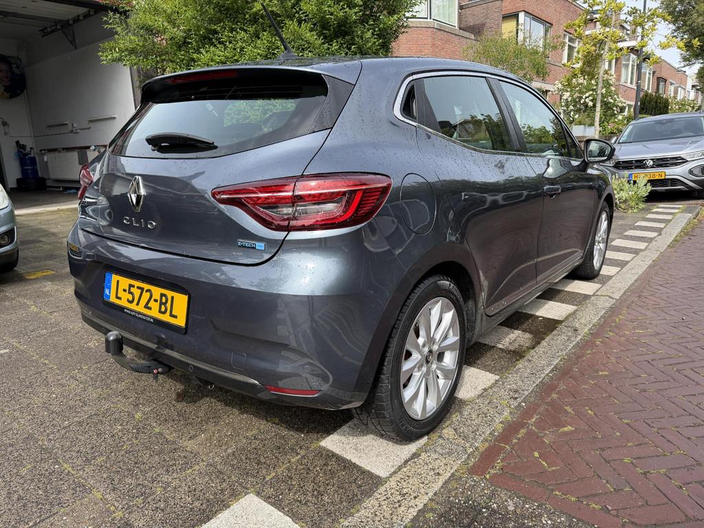 Renault Clio 1.6 E-Tech Hybrid 140 Intens, Gebruikt, 4 cilinders, Met garantie (alle), Origineel Nederlands