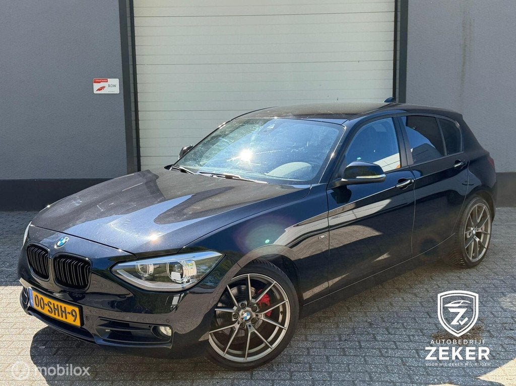 BMW 1-serie 118i Sport Line / automaat / nap / navi / cruise, Auto's, BMW, Euro 5, Achterwielaandrijving, 4 cilinders, 1290 kg