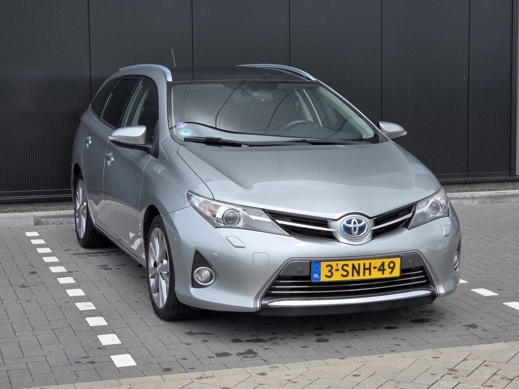 Toyota Auris Touring Sports 1.8 Hybrid Lease Pro, Euro 5, Gebruikt, Leder en Stof, Origineel Nederlands