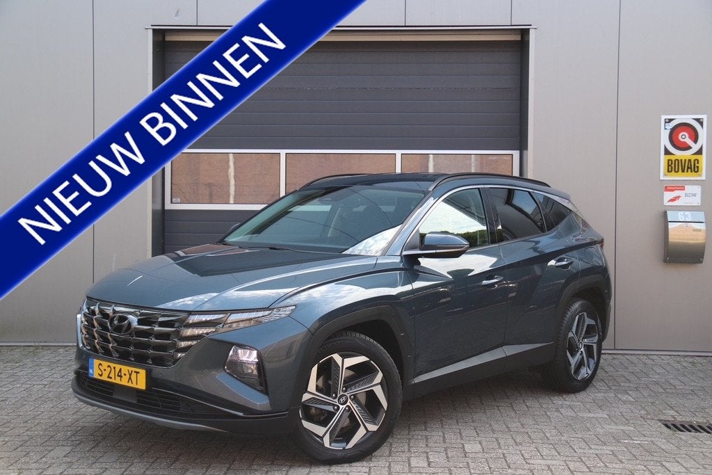 Hyundai Tucson 1.6 T-GDI PHEV Comfort Smart 4WD, Stoel & Stu, Automaat, 1350 kg, Stof, Gebruikt