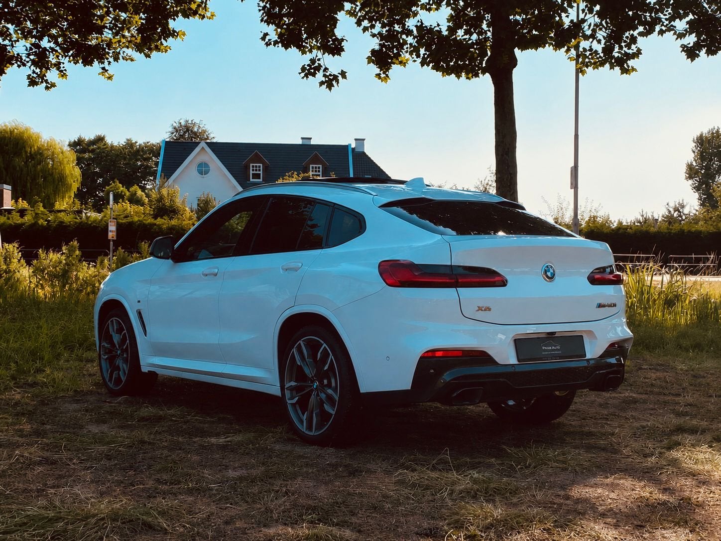BMW X4 M40i High Executive |PANO|TREKHAAK|HUD|CARPLAY|DEALER, Auto's, Dealer onderhouden, Gebruikt, Wit, Leder