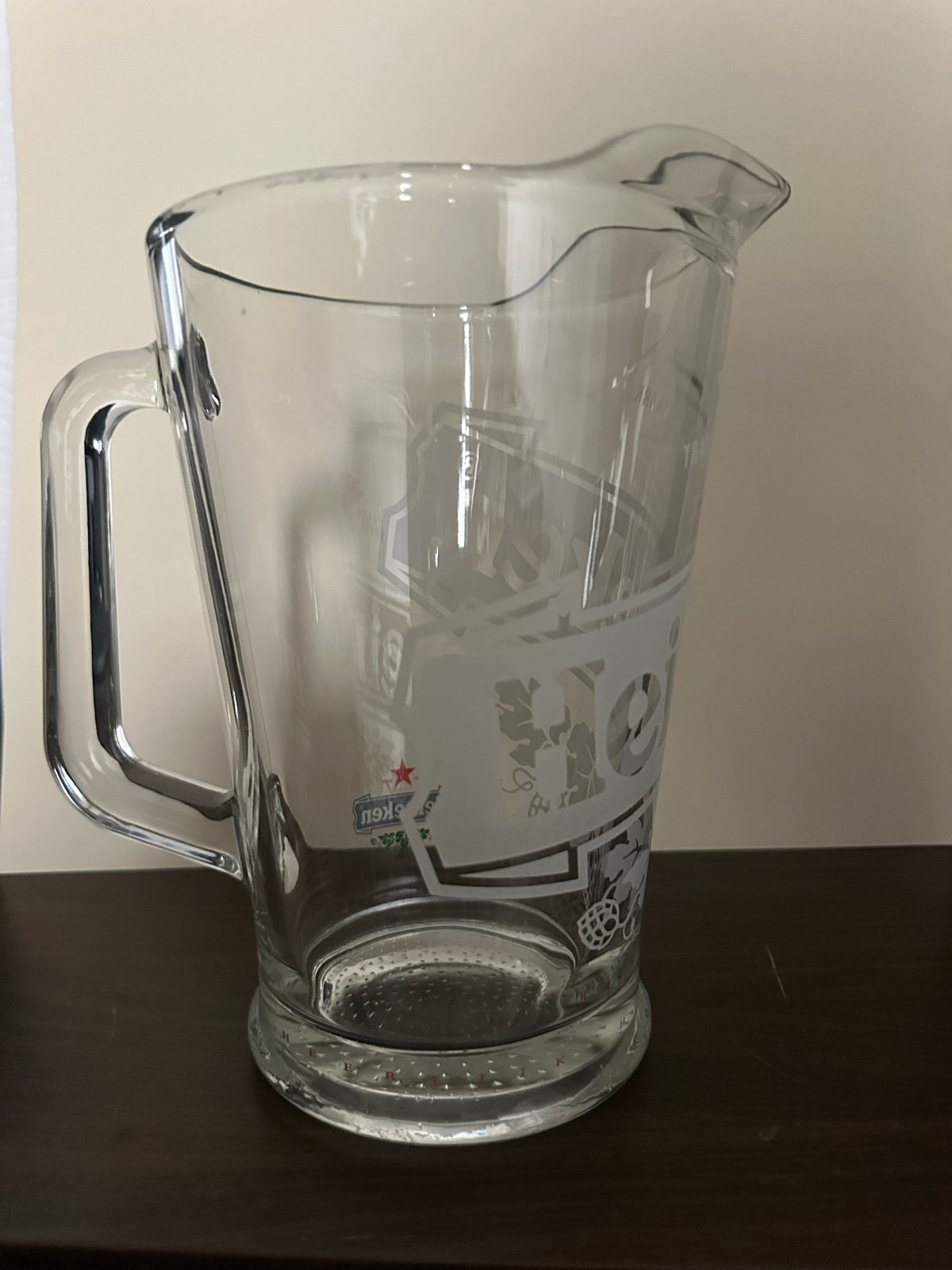 Glazen bierkan met logo's van Heineken en Dommelsch, Ophalen of Verzenden, Zo goed als nieuw, Bierglas