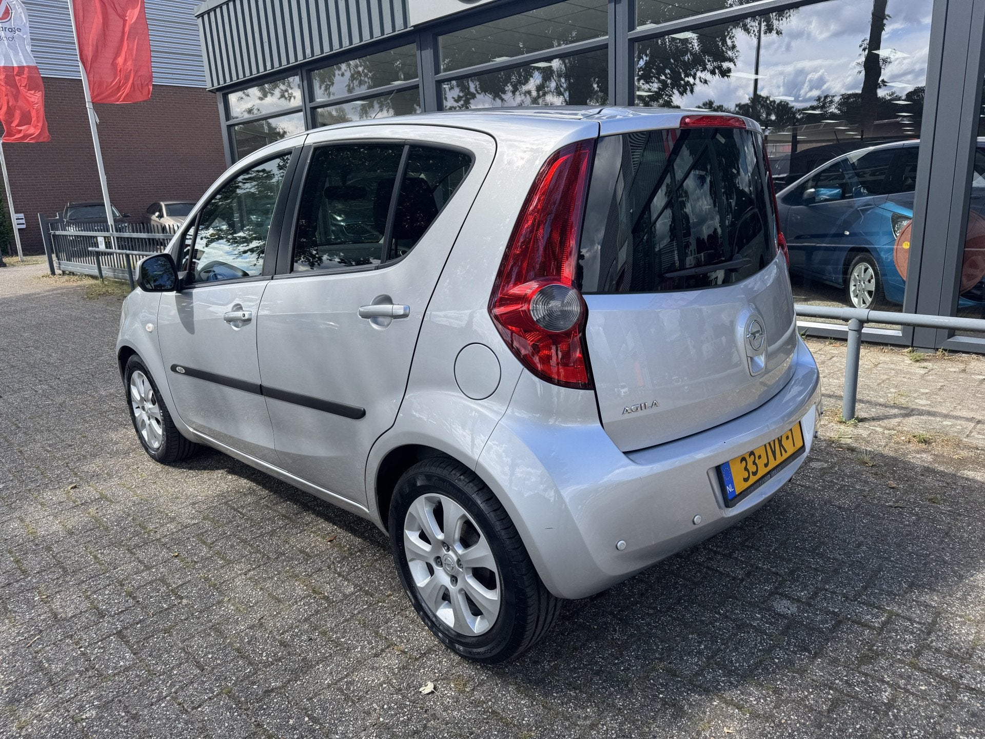 Opel Agila 1.2 Enjoy HOGE ZIT-AUTOMAAT-AIRCO (bj 2009), Auto's, Origineel Nederlands, Bedrijf, 17 km/l, Hatchback