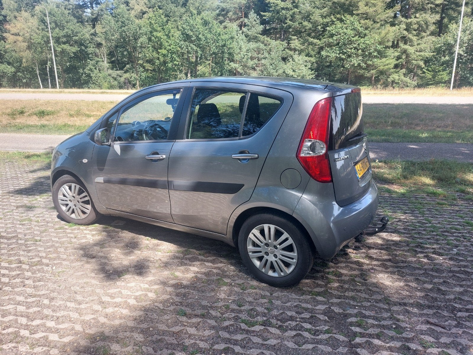 Suzuki Splash 1.2 2011 Grijs, Voorwielaandrijving, 40 €/maand, 4 cilinders, 965 kg