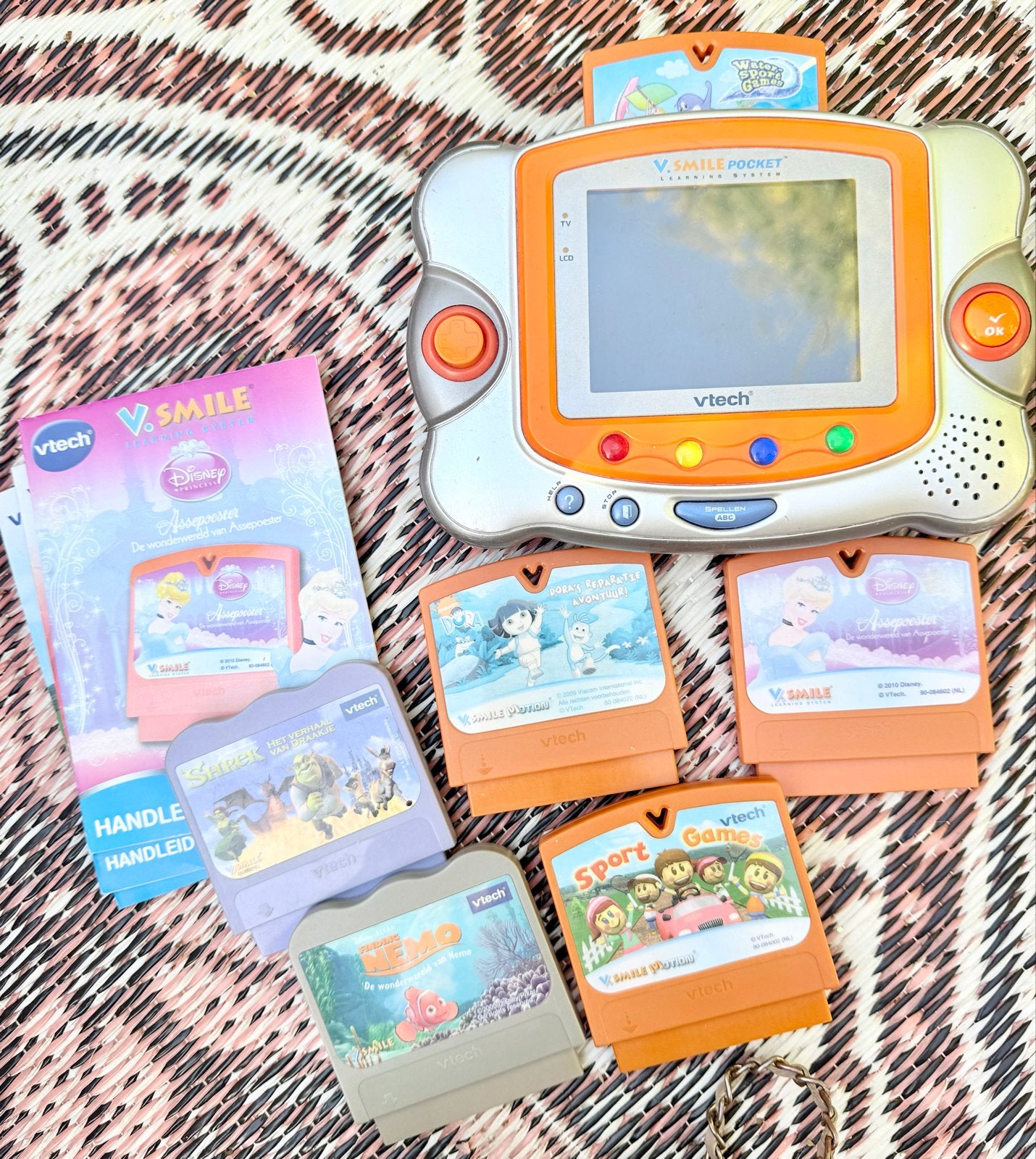 VTech V.Smile Pocket met 5 spellen en handleiding, Ophalen of Verzenden, Zo goed als nieuw, 4 tot 6 jaar