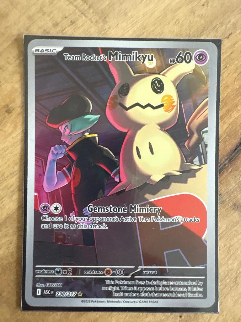 Team rocket’s Mimikyu 238, Ophalen of Verzenden, Nieuw, Losse kaart, Foil